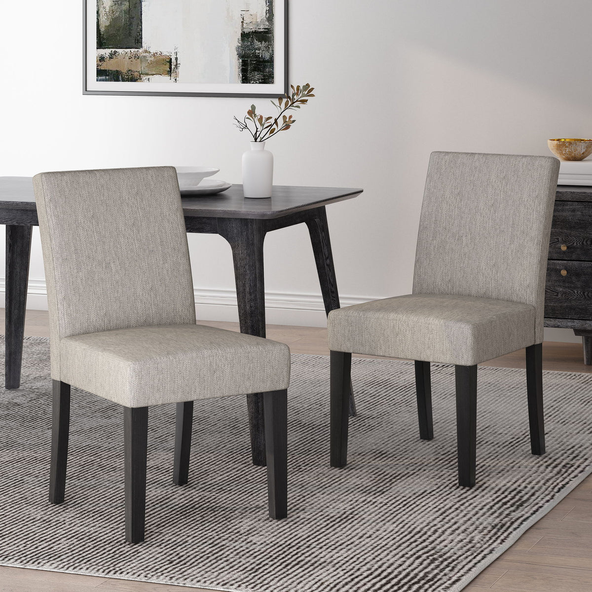 Contemporary Dining Chair With Upholstered Seating And Tapered Legs